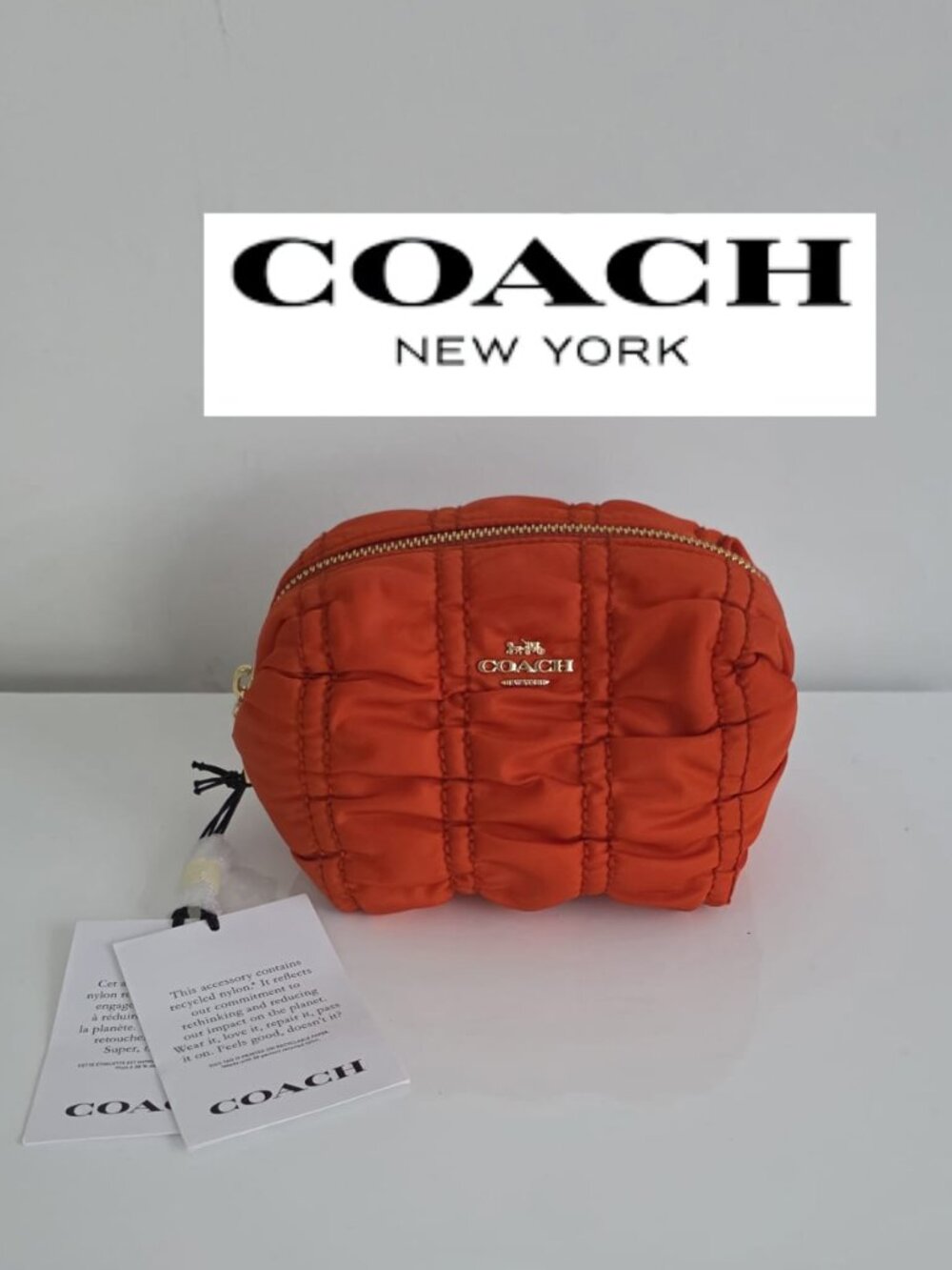 Coach Orange Quilted Cosmetic Pouch
